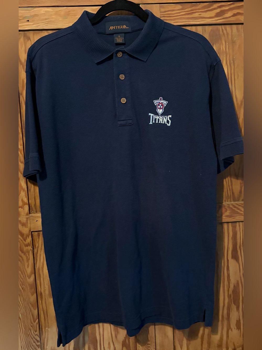 Men’s Antigua Navy Polo 100% cotton knit. Tennessee Titans Logo. Small. VGUC